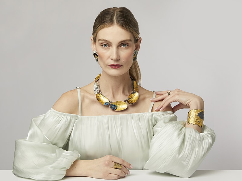 Earrings and necklace by So Young Park, bracelet and rings by Emanuela Duca