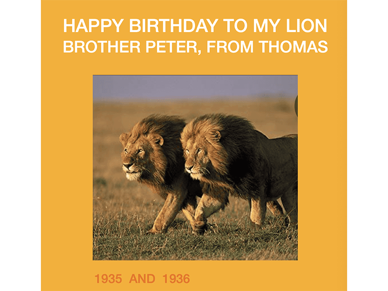 Two male lions side by side, with a birthday greeting from Thomas to Peter