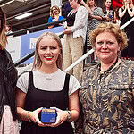 Abigail Ellen Pontefract (at center) winning the award at New Designers, in London, 2023