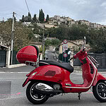 Up, up, up, climb the hills of Haut-de-Cagnes—the historical part of Cagnes-sur-Mer—navigating the narrow curves, until you reach the top. I hadn’t piloted a motorcycle in 20 years and was scared to death to drive the 30 minutes from my brother’s apartment on his apple-red Vespa, but it turned out to be great fun, and it made parking in the medieval village so much easier. | In the distance, Haut-de-Cagnes, with the Château-Musée Grimaldi and Espace Solidor – Musée du Bijou Contemporain on the hilltop, photo: Nathalie Mornu