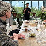 Staff at De Kas explaining the philosophy of the restaurant and our special menu. The meal was delicious, photo: Bill Baker