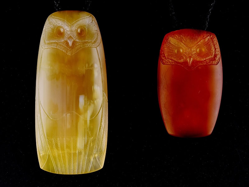 Aaron Brown, Ruru, 2024, (left) necklace in honey agate, 3 ½ x 1 ⅝ x ⅝ inches (90 x 40 x 15 mm), (right) necklace in carnelian, photo: Michael Couper