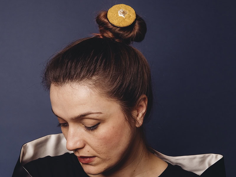 Huimin Zhang, Mountain and Wind, 2025, hair pin in silver-plated gold (top), sterling silver, ebony, 5.4 x 5.4 X 13 cm, photo: Patrick Gunning @ bufola, model: Livvie May @maylivvie