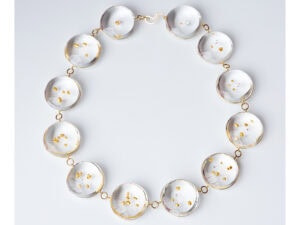 Ted Noten, The Sweetest Piece I Ever Made Vol. 2, 2023, necklace in 24-karat gold, diamonds, cast in acrylic (PMMA), 18-karat gold connections, 9.5 x 5.9 x 0.6 inches (240 x 150 x 16 mm), photo courtesy of Ornamentum
