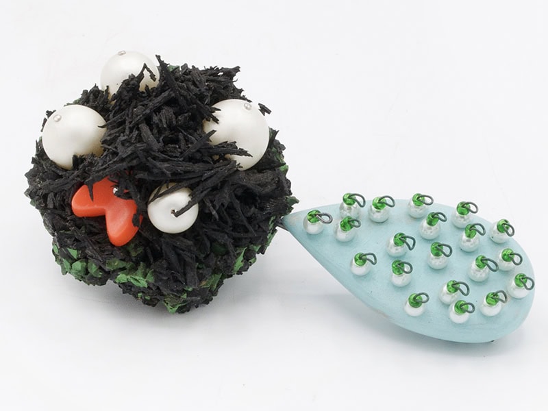 Chelsea Nanfelt Rowe, Nesting, 2024, brooch in reused rubber, vintage Lucite, reused beads, steel, sterling silver, 4 x 2 x 1 ⅛ inches (100 x 50 x 30 mm), photo courtesy of the artist