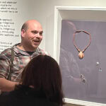 Guest curator and IAIA Assistant Professor Brian Fleetwood guided us through his exhibition of contemporary jewelry created by more than 100 Indigenous artists, photo: Nathalie Mornu