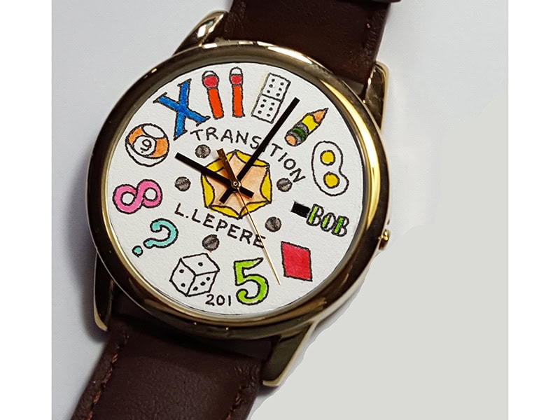 Leslie LePere, Transition, 2016, wristwatch, India ink and watercolors, 1 ½ x ⅜ inches (3.8 x 1 cm), photo courtesy of Autumn Brown. Les produced this watch for the ZOOM Symposium exhibition “In Transit,” which featured work about transition. He said, “Time is always in transition and will be more so when ‘In Transit.’”