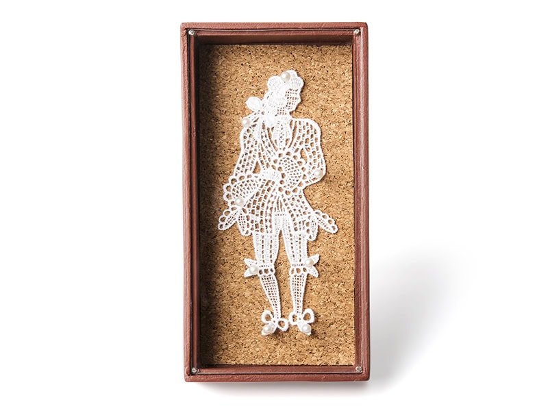 Geraldine Fenn, Collecting the Colonials I, 2022, brooch in cardboard, paint, cork, found object (vintage Venetian lace), silver, pearls, steel pin, photo courtesy of the artist