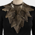 Choosing jewelry as a method is a way for Hellman to challenge how refined a material can be. “What would you consider placing around your neck?” she asks. “Someone else’s skin? Any kind of skin?” | Caption: Marianne Hellman, 19 Deer, necklace in bark-tanned roe deer ears, waxed linen thread, photo: Hanna Klintskär