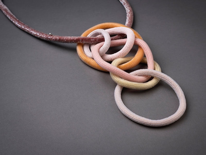 Jane Bowden, Connections - Studies in Beads, 2024, neckpiece/bangle in size 15/0 Miyuki glass beads, sewing cotton, 15 ¾ x 6 x 1 ¼ inches (400 x 150 x 30 mm), photo: Michael Haines