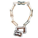 Mayte Amezcua, Backbone II, 2025, fabricated necklace in treated wood, acrylic paint, 33.5 x 17 x 3 cm, photo: artist