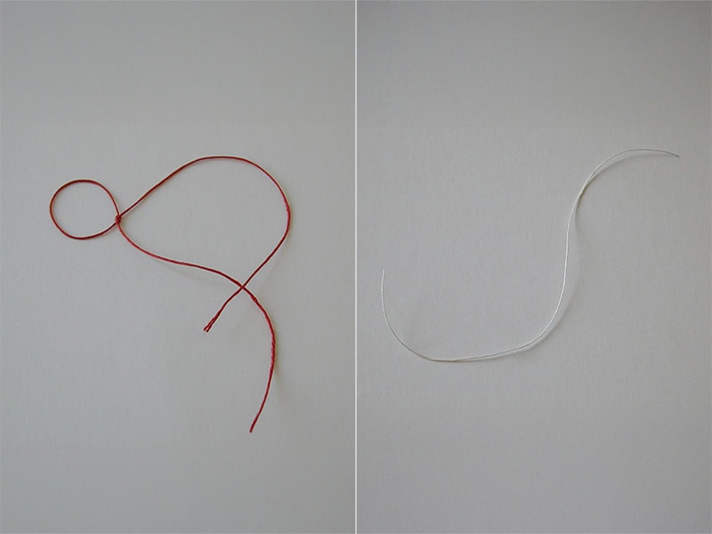 (Left) Elizabeth Callinicos, Untitled (ring); (right) Armanda Duarte, Um Intervalo (An Interval), 2004, links from A Chain for Tereza in (respectively) red thread, 4 ¾ inches (120 mm); stiff white thread from a dismantled necklace, variable dimensions, collection of Tereza Seabra, photo: C.B. Aragão
