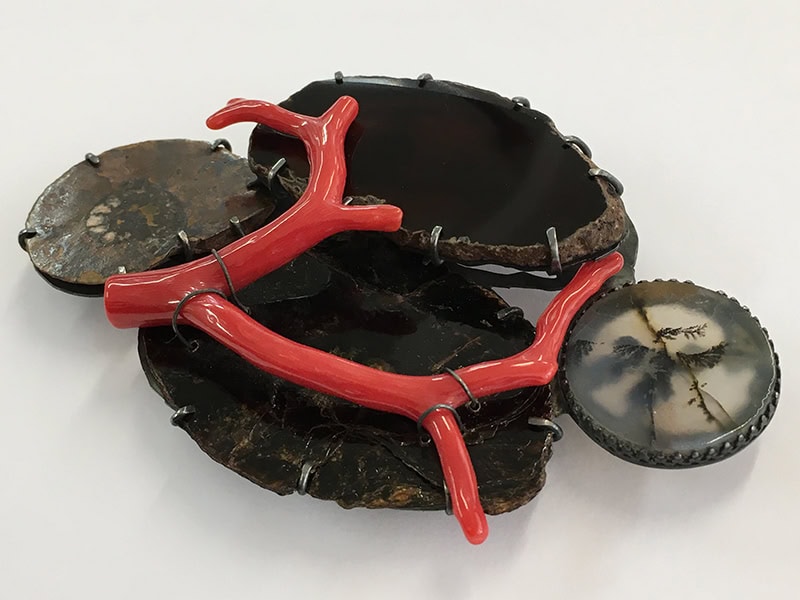 Tereza Seabra, Hidden Tresor’s IX, 2017, brooch in oxidized silver, coral, dendritic agate, mica, ammonite, agate, 3 ½ x 2 ⅛ x ⅜ inches (90 x 55 x 10 mm), artist's collection, photo: Catarina Silva
