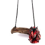 “My work explores the forgotten spaces of the city, where an accumulation of materials and objects have taken the corners between concrete and earth,” says Sandra Bostock. ||| Sandra Bostock, Urban Walks Red, 2021, necklace in wood, copper, sterling silver, powder-coated paint, 10 x 5 x 7 cm, photo: Felipe Flores