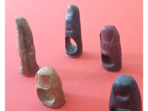Márcia Cirne’s fingers, from the Safo series, at the Aries exhibition. The rings are made of wood and copper, photo: Kaia Ansip