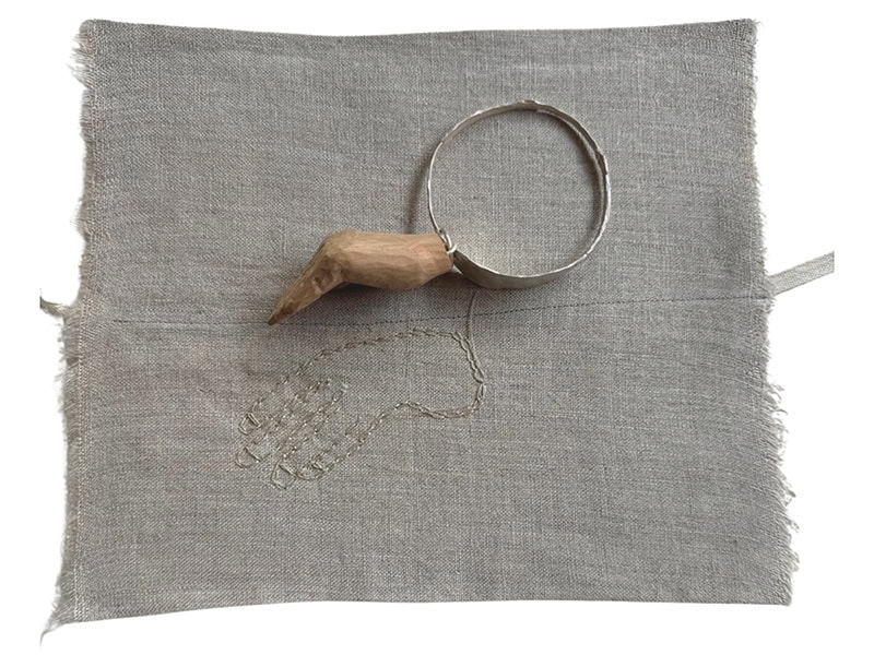 Jimena Rios (+ Iris Eichenberg), Virgo II, 2025, bracelet in silver, wood, French linen, bracelet 2 ⅝ inches (67 mm) in diameter, photo: Iris Eichenberg
