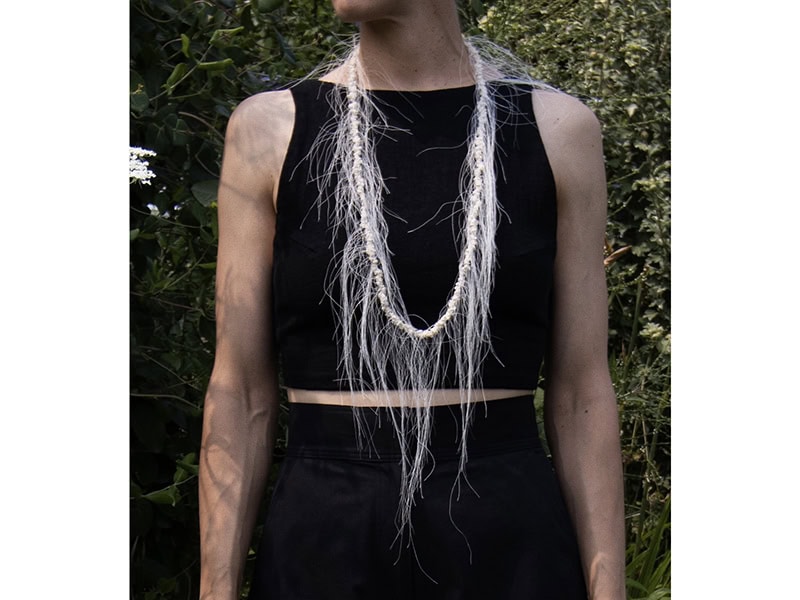 Jolynn Santiago, At Arm's Length: 176,950 Knots, 2024, necklace in hand-knotted silk beads, 25 x ¼ inches (635 x 5 mm), photo: artist