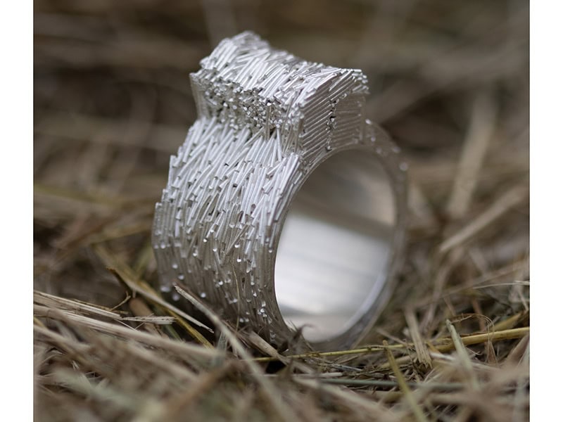 Jolynn Santiago, Field Clippings Ring, 2024, in hand-cut sterling silver wire, fine silver sheet, 1 x ¾ x ⅜ inch (25 x 19 x 11 mm), photo: artist