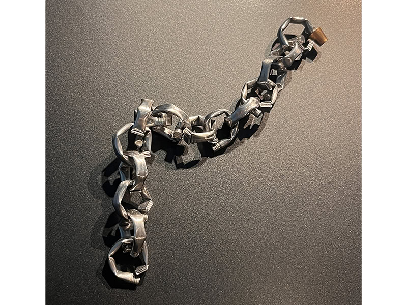 Saravich Sungtrakankul, Tin Tubes, 2023, necklace in tin, at Vitsœ, Munich, Germany, photo: Kellie Riggs