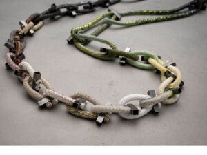 Jane Bowden, Sequence—Studies in Beads, 2024, neckpiece in oxidized sterling silver, hand-crocheted with 0.6 mm and 0/5mm crochet hooks using cotton sewing thread, Miyuki Japanese glass beads size15/0, 1 x 1 x 50 inches (25 x 25 x 1270 mm), approximate hanging length 23 ½ inches (600 mm), photo: Michael Haines