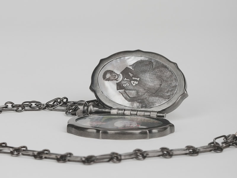 Lillian Luft, Once Decoupled, 2022, necklace, steel, mother-of-pearl, photograph, glass, archival ink, locket 2 ⅜ x 1 ¾ x ⅜ inches (60 x 45 x 10 mm), chain 27 ½ inches (700 mm), photo: Eric Skadson