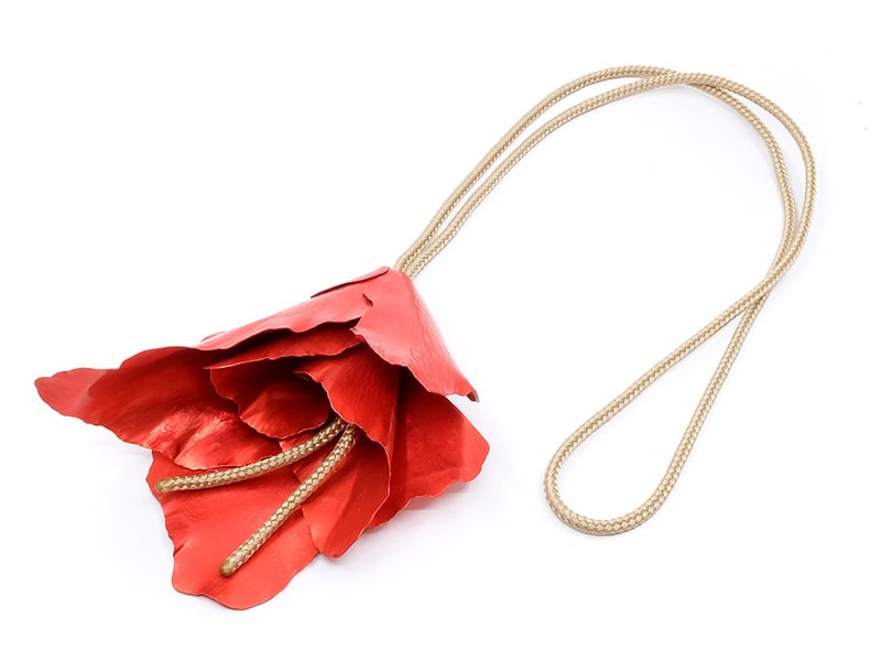 Sanna Wallgren, Red 1, 2024, pendant in aluminum, nylon, 12 ½ x 4 x 2 inches (320 x 100 x 50 mm), photo: Sofia Björkman