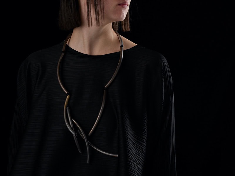 Linda van Niekerk, Melting Weathered Clouds, 2024, neckpiece in oxidized sterling silver, silk, 17 ¼ inches (440 mm) long when worn, tube ¼ inch (8 mm) in diameter, photo: Peter Whyte Photography