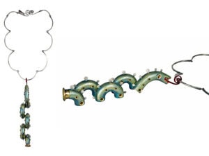 Lisa & Scott Cylinder, Cetus (Sea Serpent) Necklace, 2025, in vintage brasswind tubes, sterling silver, brass, tagua nut, enamel paint, nylon, mica powder. Necklace: Sterling silver, necklace 17 inches (432 mm), pendant: 7 x 1 ½ x 1 inches (178 x 38 x 25 mm), photo courtesy of GLG