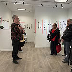 We ended our tour with Charon Kransen’s 40-artist exhibition “Time, Such a Great Sculptor.” Kransen (at left) is a gallery member of AJF