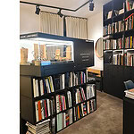 Visitors sometimes think that the gallery is also a bookstore. Indeed, there are as many books as there are pieces of jewelry! Photo courtesy of Galerie MiniMasterpiece