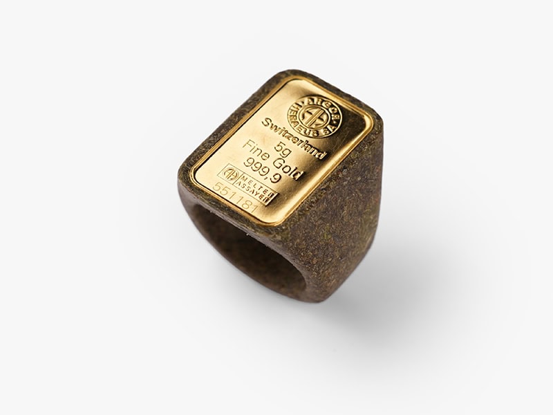 Zhipeng Wang, Identity Ring #Swiss Gold, 2026, ring in Longjing tea, 24-karat Swiss gold, 1 x 1 x 1 inches (26 x 25 x 26 mm), photo courtesy of the artist