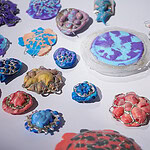 Siri Hansen recently graduated with an MFA from Konstfack University. Before that, she attended the Glasgow School of Art for her bachelor’s degree. Hansen mainly produces brooches. The works shown here are from her MFA collection, All That Glitters Was Thrown Away. | Siri Hansen, All That Glitters Was Thrown Away, 2026, brooches in discarded plastics, sterling silver, cubic zirconia, stainless steel, photo: artist