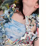 McPherson’s approach to her chosen materials is informed by her experiences within natural history museums. Her visual language is influenced by these institutions, which preserve evidence of life and the forces that shape it. The pieces emerge from extensive research spanning animal materials and their symbolism, the existence and broader conceptual implications of plastic waste, environmental concerns, and the use of fictional narratives to address real ecological crises. | Larissa McPherson, Specimen XXI (021) in Habitat, 2026, in bone, biodegradable PLA, found plastic, found carpet foam, found mesh, found cord, acrylic spray paint, 30 x 19 ½ x 3 inches (76.2 x 49.5 x 7.6 cm), photo courtesy of the artist