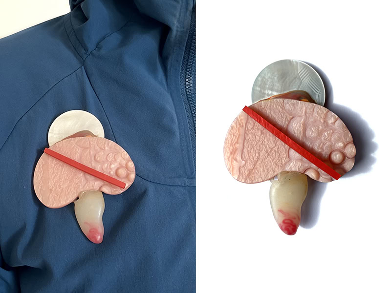 Danni Schwaag, Allowed?, 2024, brooch in galalith, colored glue, mother-of-pearl (with guilloché), silver, stainless steel, 2 ¾ x 3 ½ inches (70 x 90 mm), photo: Four