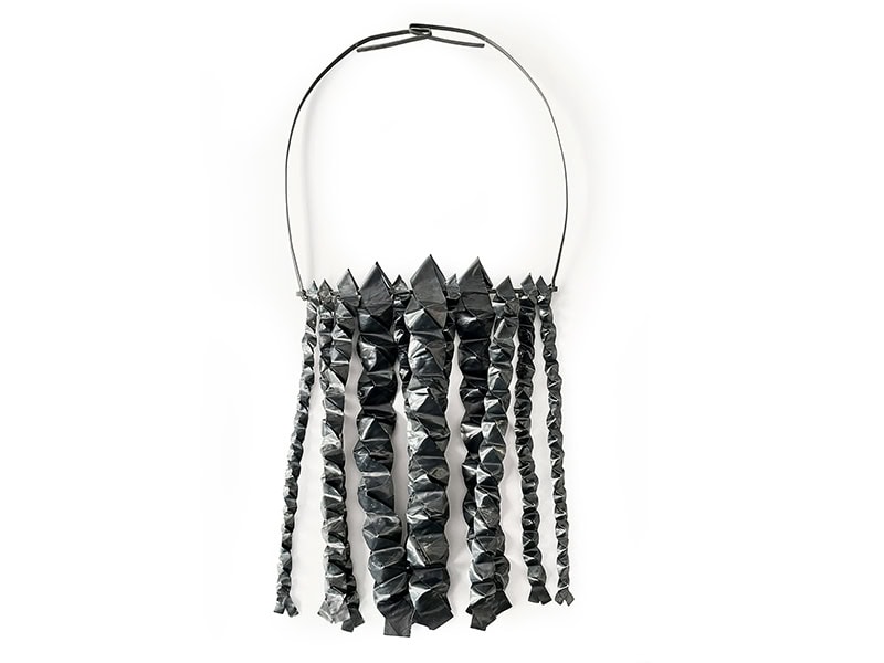 Ameli Dévé, Untitled, 2024, necklace in oxidized silver, 14 ⅜ x 6 ¼ x ¾ inches (360 x 160 x 20 mm), photo: Sofia Björkman
