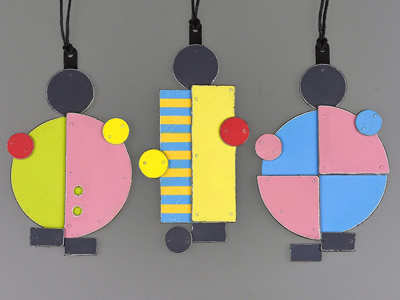 Becky Bliss, Play Time, 2024, pendants in mild steel, sterling silver, paint, cord, (left to right) 93 x 52 mm, 103 x 48 mm, 96 x 58 mm, photo: Michael Couper
